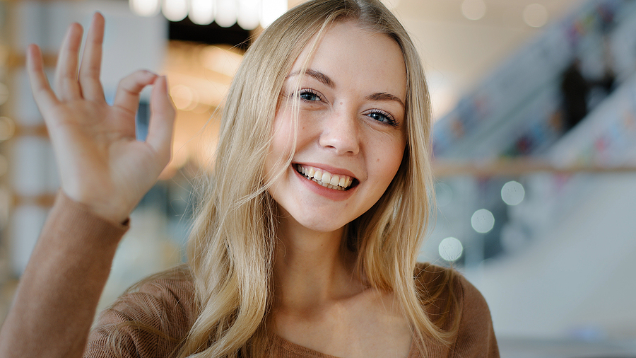 Close-up Young Girl Smiling Showing Gesture Sign Ok Caucasian Wo Services
