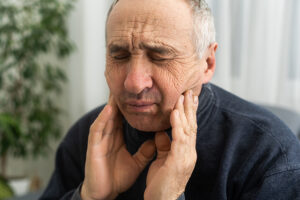 Elderly Senior Man Has Toothache